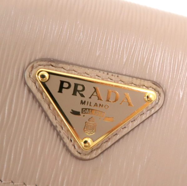 2000237256500009 3 Prada card case pink beige