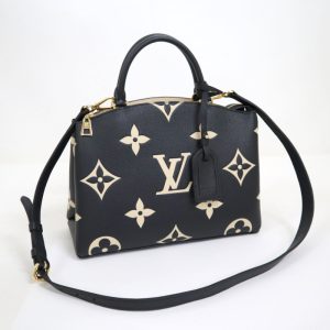 2000773256600073 1 Louis Vuitton Lock Me Backpack Taurillon Leather LV Logo Twist Lock Black