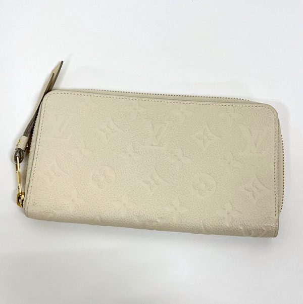 2001017255000559 1 Louis Vuitton Portefeuille Scretron Wallet Empreinte Neige