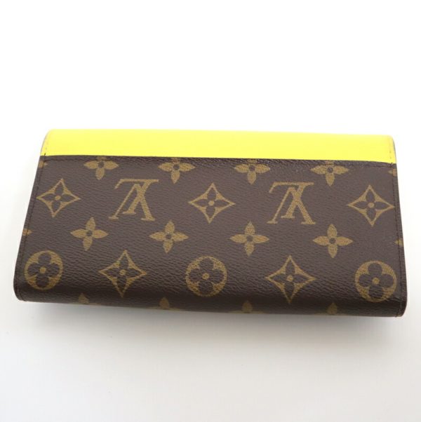 2001017256600760 2 Louis Vuitton Portefeuille Sara Tribal Mask Jaune