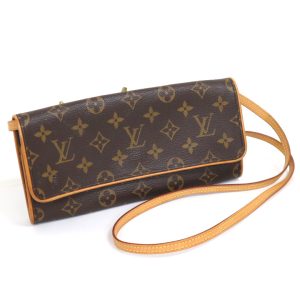 2001198256100194 1 Louis Vuitton Black Monogram Empreinte Wild at Heart Melanie Pochette