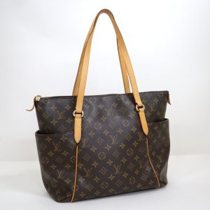 2001198256500238 1 Louis Vuitton Epi Saint Jacques Handbag Brown