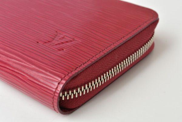 210225 64 lv 11 Louis Vuitton Zippy Wallet Long Epi Fuchsia