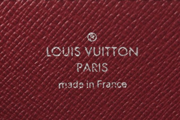 210225 64 lv 8 Louis Vuitton Zippy Wallet Long Epi Fuchsia