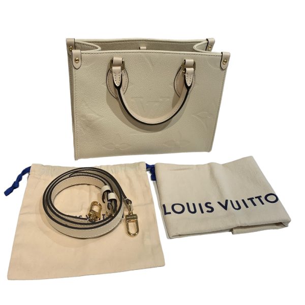 2300039826809 12 LOUIS VUITTON On the Go PM Empreinte White Shoulder Bag