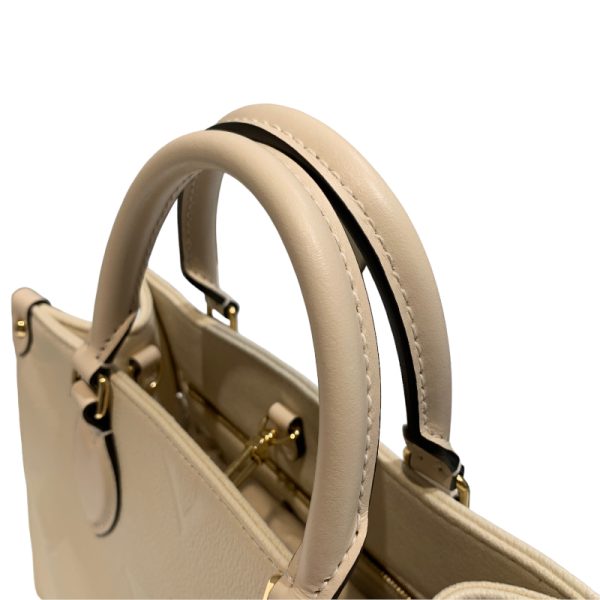 2300039826809 5 LOUIS VUITTON On the Go PM Empreinte White Shoulder Bag