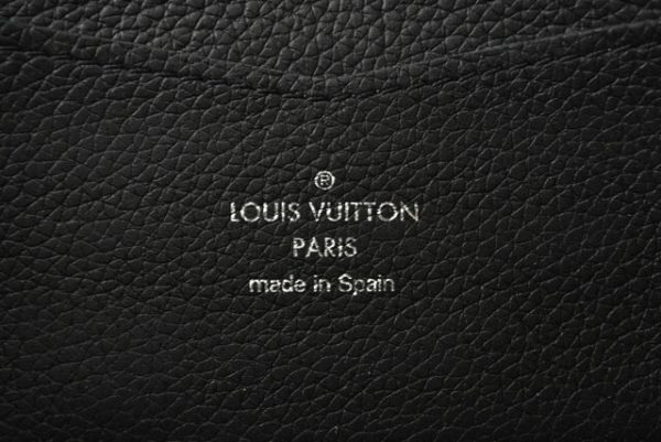 230729 lv 9 Louis Vuitton Zippy Lock Me Noir Wallet