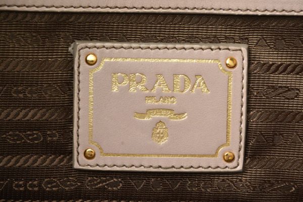 23112519 p 6 Prada Handbag Nappa Beige