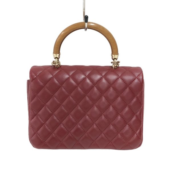 2342250005083 1 CHANEL Matelasse Knock on Wood Top Red Lambskin