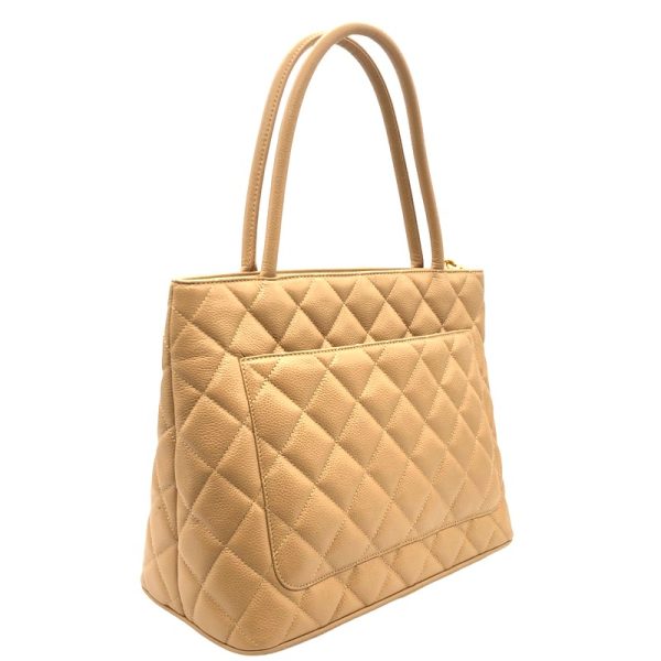 2342290031776 2 CHANEL tote beige caviar skin tote bag