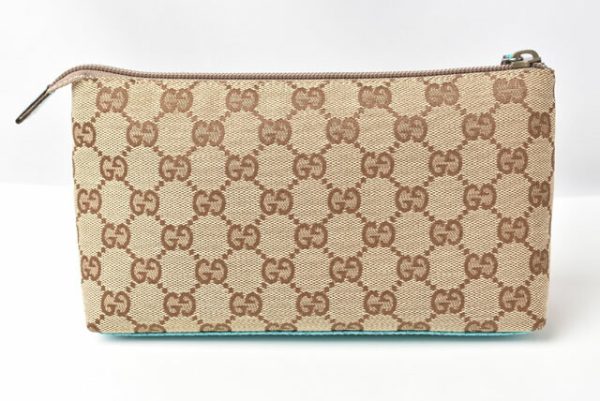 24020209 g 2 Gucci Pouch GG Beige