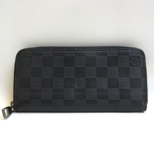 3 lv201210 2u Chanel CC Filigree bi flong wallet caviar skin black