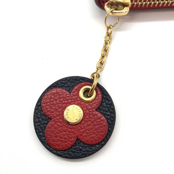 3 lv240322 1r 04 Louis Vuitton Long Wallet Clemence Empreinte Flower Charm