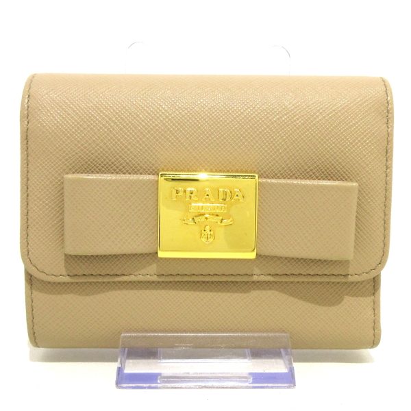 37897779 1 PRADA Wallet ribbon beige leather