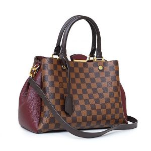 744 9 1 LOUIS VUITTON Porochon 70 Monogram Handbag