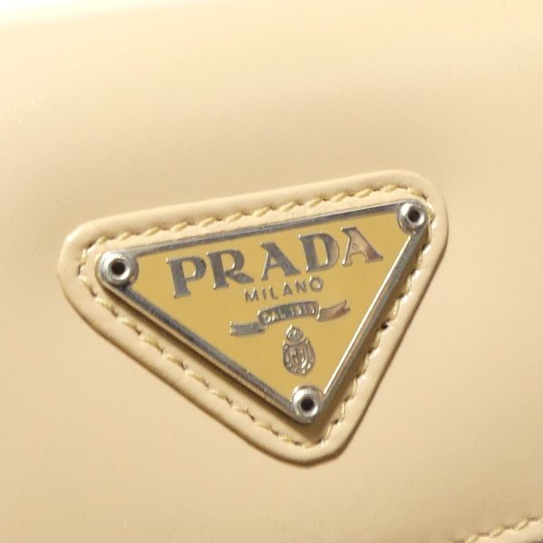 8081000070943 3 PRADA Triangle Plate Wallet Beige