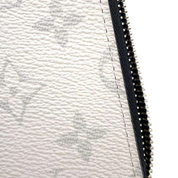 9179943 09 Louis Vuitton Long Taiga Eclipse Zippy Wallet White