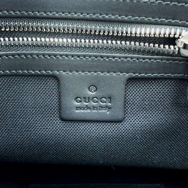 9595095 15 Gucci clutch bag GG Supreme bag black