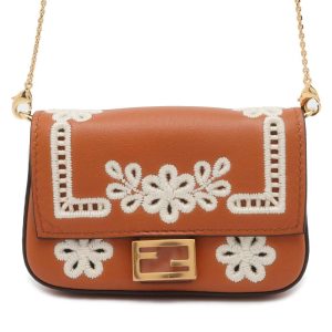 9672123 01 Pochette Discovery Bag Macassar Brown Black