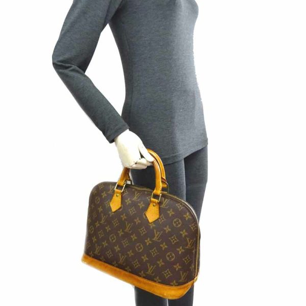 dh66313 10 Louis Vuitton Alma Monogram Handbag Brown