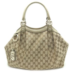 dh80127 1 Louis Vuitton Cousan Monogram Handbag Brown