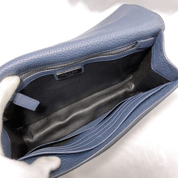 f 20558 7 Prada blue strap Saffiano clutch bag flap triangle plate