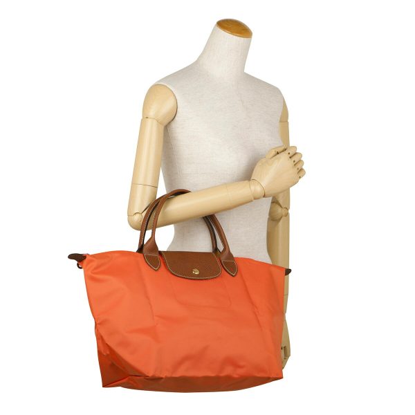 glo1623089p85 6 Longchamp Le Pliage Top Handle Bag M Handbag Orange