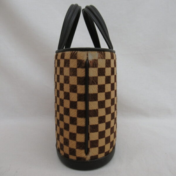 imgrc0082678020 Louis Vuitton Impala Damier Sauvage Handbag Beige