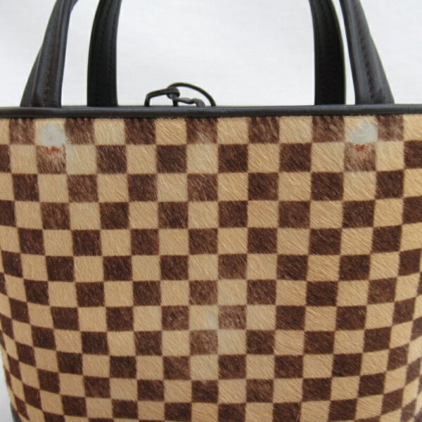 imgrc0082678023 Louis Vuitton Impala Damier Sauvage Handbag Beige