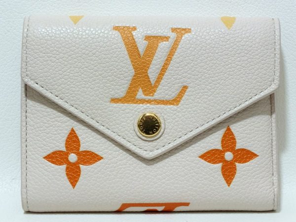 imgrc0096833321 Louis Vuitton Victorine Empreinte Wallet White