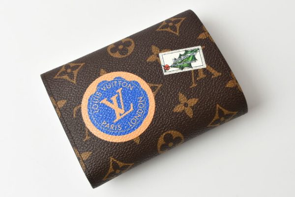 l 0130 p00182 2 3 Louis Vuitton Victorine Mini Wallet Monogram My LV World Tour