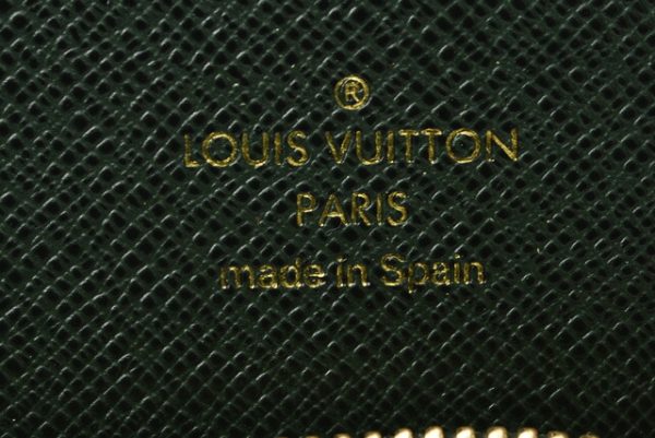 l 19 0092 10 Louis Vuitton Porte Vier Monet Zip Wallet Taiga Wallet