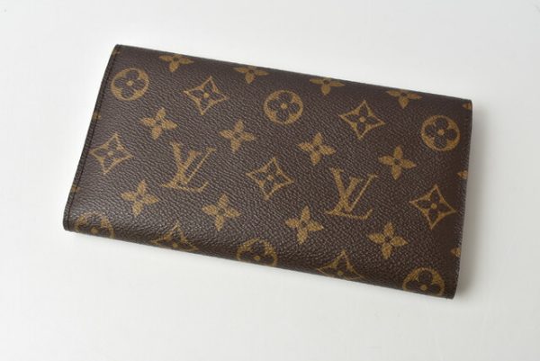 m211010 49 lv 2 Louis Vuitton Porto Tresor Wallet TrifMonogram Brown