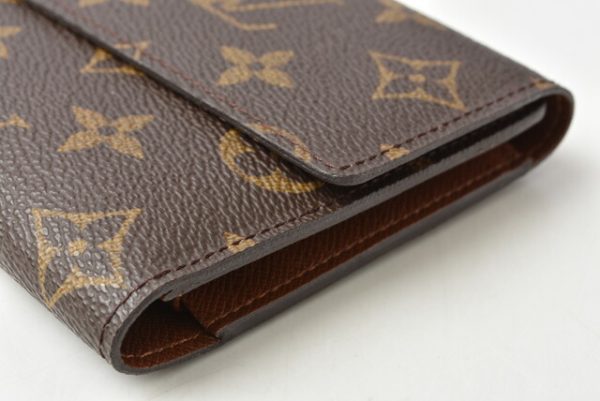 m211010 49 lv 3 Louis Vuitton Porto Tresor Wallet TrifMonogram Brown