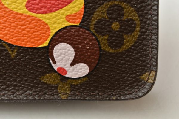 m211110 24 lv 14 Louis Vuitton Monogram Panda Zippy Wallet