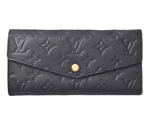 m2201 34 lv 1 Louis Vuitton Long Wallet Curieuse Monogram Empreinte