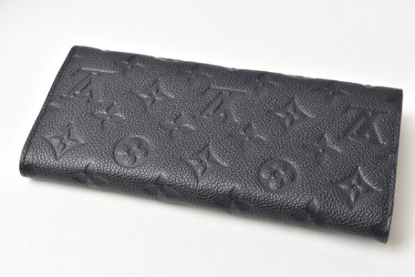 m2201 34 lv 3 Louis Vuitton Long Wallet Curieuse Monogram Empreinte