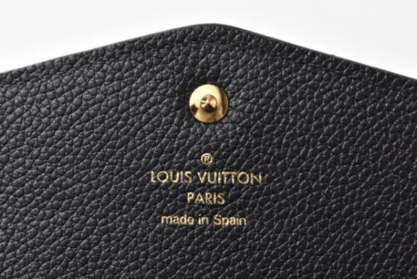 m2201 34 lv 9 Louis Vuitton Long Wallet Curieuse Monogram Empreinte