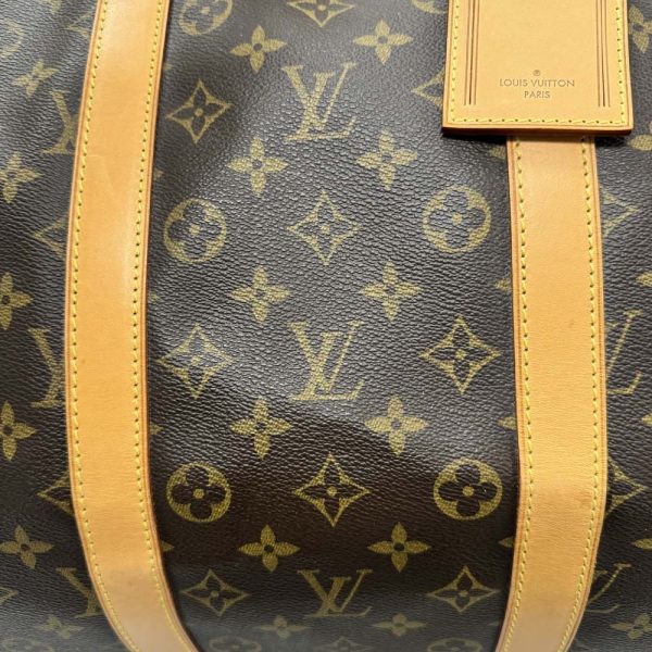 m24 1138 13 Louis Vuitton Keepall Bandouliere 55 Bag Monogram Brown