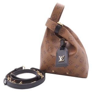 m46816 01 Louis Vuitton Manhattan Monogram Handbag Brown