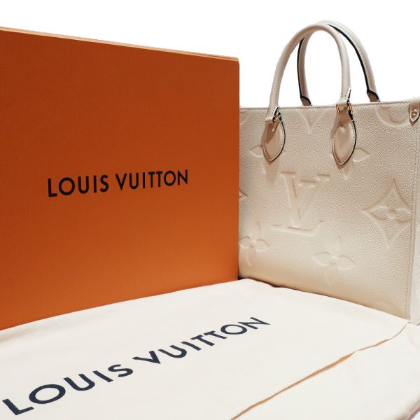 t2403 06 001694tt 08 Louis Vuitton On the Go MM Monogram Empreinte Ivory Tote Bag Handbag