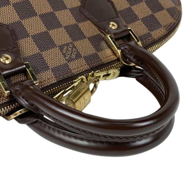 1000055204285 16 Louis Vuitton Alma Handbag Damier Brown