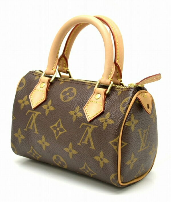 11451104 1 Louis Vuitton Monogram Mini Speedy Pouch Canvas Brown