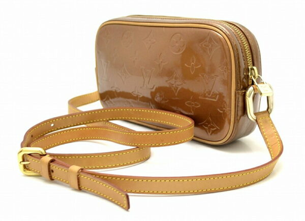 11470168 1 Louis Vuitton Vernis Christie MM Pochette Leather Bronze