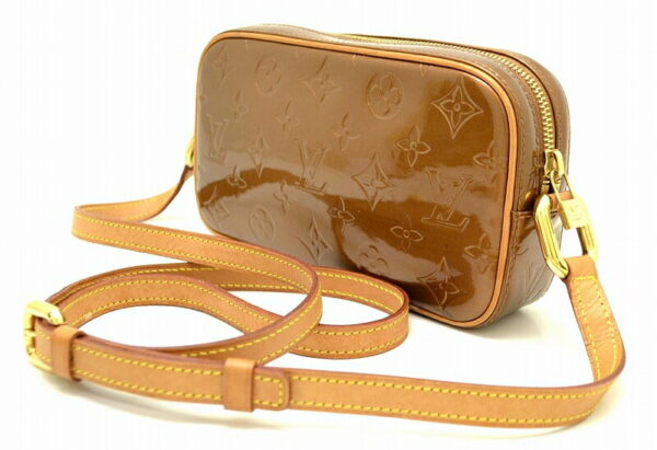 11500167 1 Louis Vuitton Christie MM Pochette Monogram Vernis Bronze