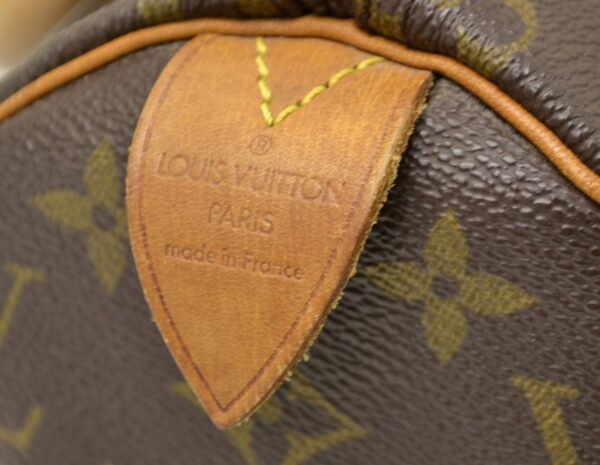 11541346 4 Louis Vuitton Speedy 25 Handbag Monogram Brown