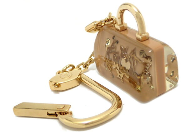 11570814 1 Louis Vuitton Unclusion Key Ring Beige