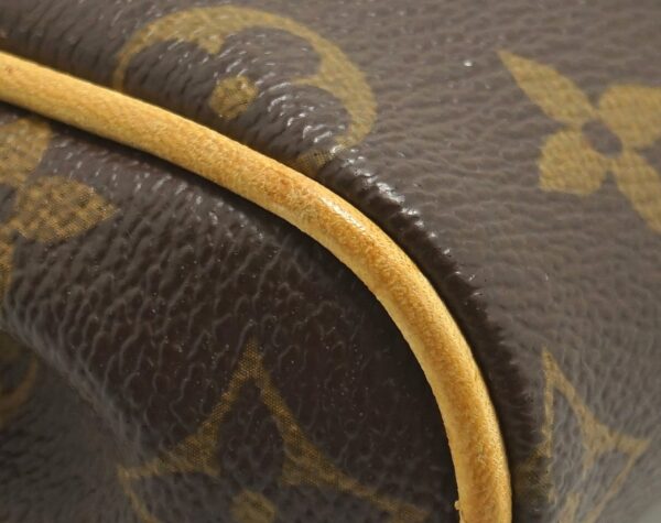 11611403 2 Louis Vuitton Eva Accessory Pouch Monogram Brown