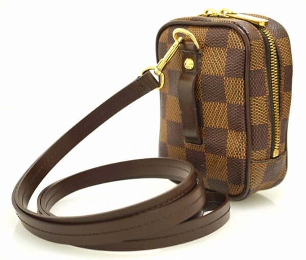 11641299 1 Louis Vuitton Okapi PM Mini Pouch Damier Brown