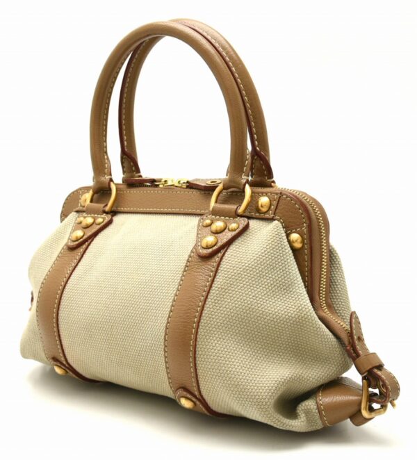 11651929 1 Louis Vuitton Sac de Nuit PM Handbag Antigua Beige